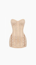 Beige corset on a white background