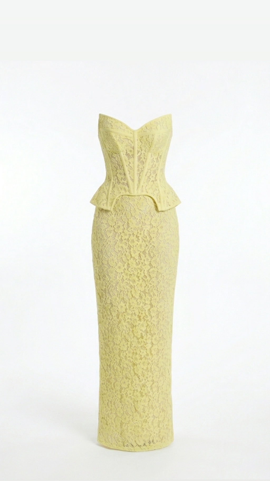 Yellow textured dress on a white background