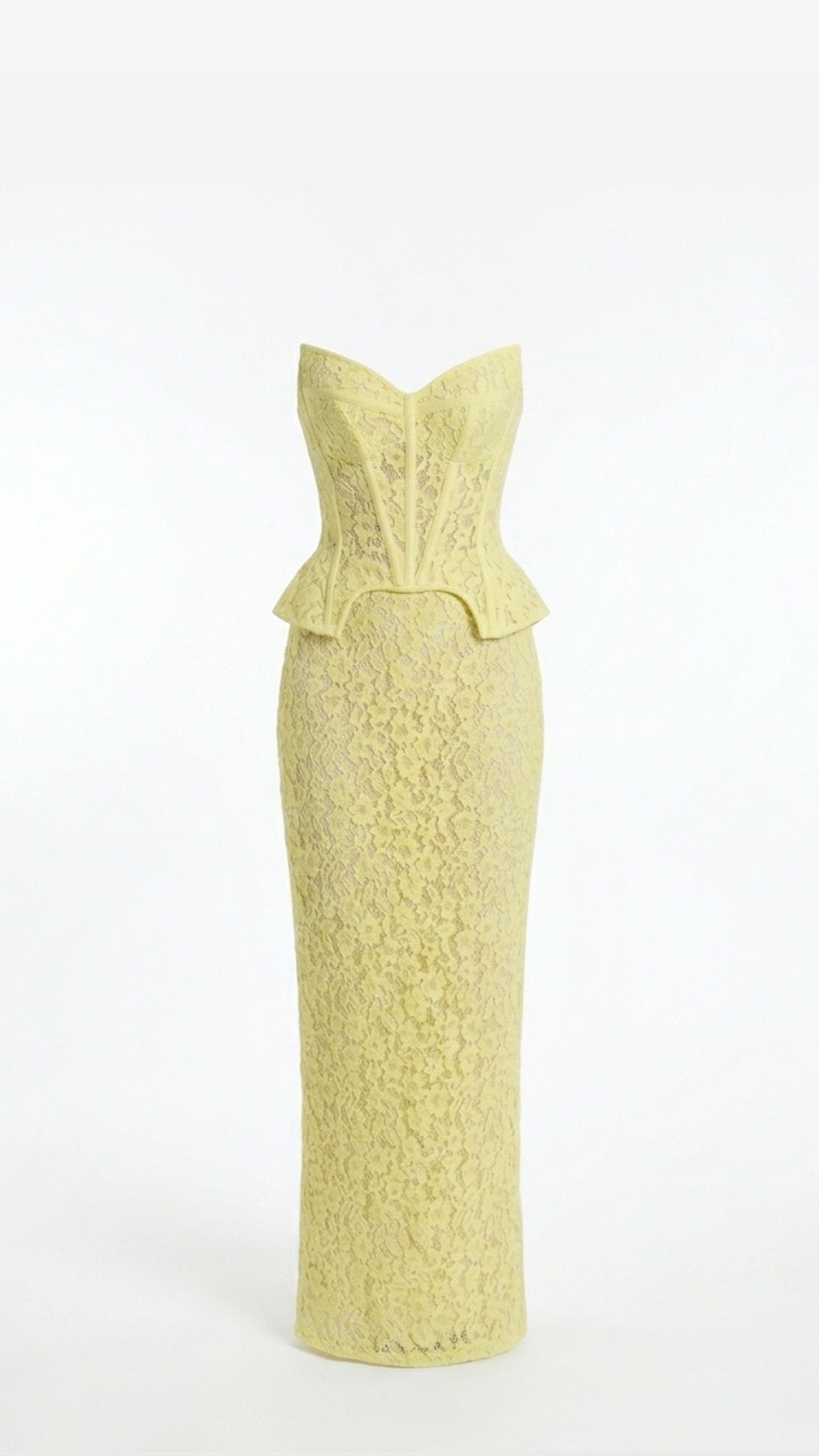 Yellow textured dress on a white background