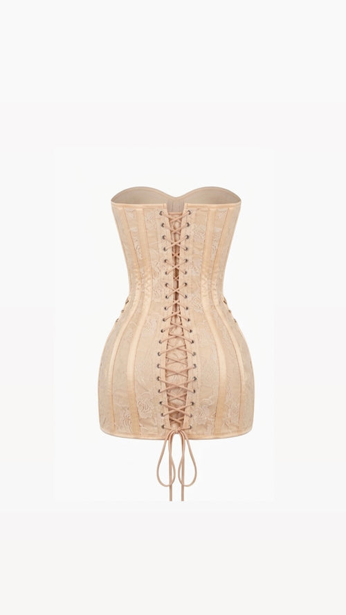 Beige corset on a white background